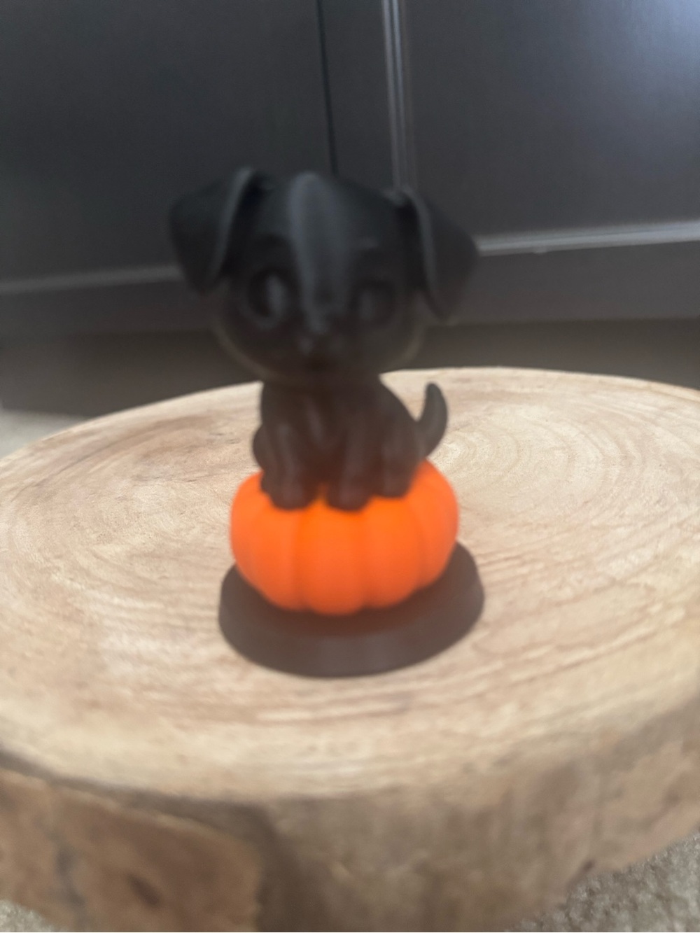 Black Puppy Figurine on Orange Pumpkin Decorative Accent